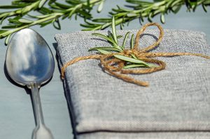 Spoon with napkin & rosemary herb image