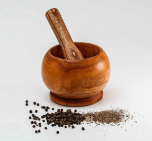 Grind whole spices with mortar and pestle