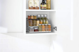 Maximize your kitchen cabinet space and keep spices organized with this pull down spice rack