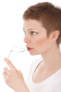 Drinking sufficient water daily helps keep your body hydrated which contributes to clear glowing skin