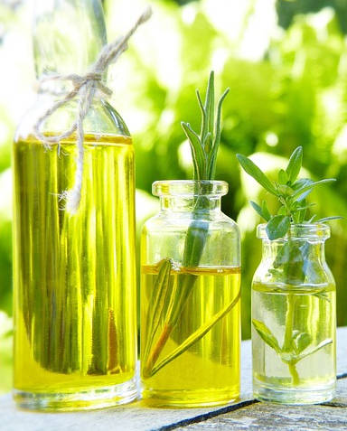 Herb infused Oil in Bottles