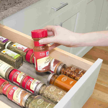 The soft foam keeps spice bottles securely in place. This prevents the bottles from moving when you open or close the drawer.